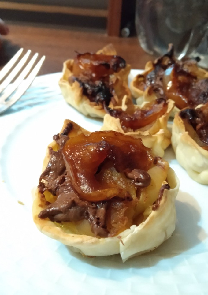Una foto de Strudel de manzana fáciles! con tapas de empanada