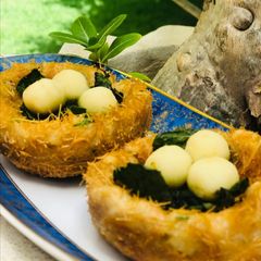 Special bird nest With potato,vermicelli and cottage cheese egg A picture of Special bird nest With potato,vermicelli and cottage cheese egg.