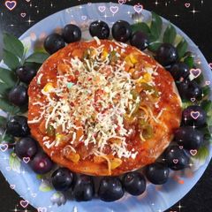 A picture of Homemade tawa pizza.