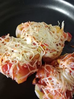 Una foto de Patatas rellenas de pollo y verduras