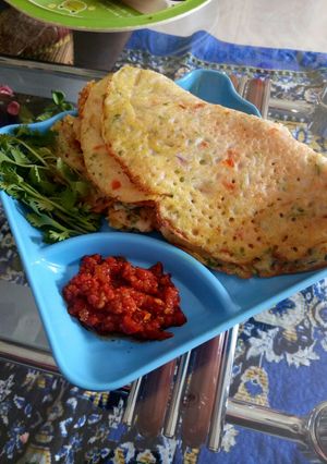 A picture of Uttapam with idli batter.