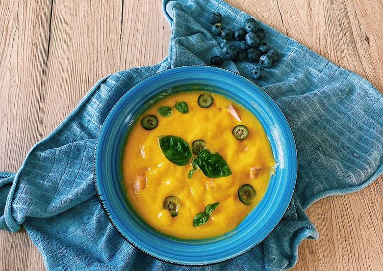 Tasty And Delicious of Mango soup with salmon, blueberries and basil💛