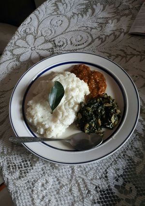 A picture of Spinach with mushrooms.