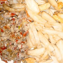 A picture of French fry and egg sauce.