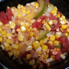 A picture of Vegetables on a stovetop.