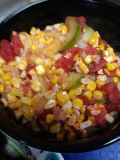 A picture of Vegetables on a stovetop.