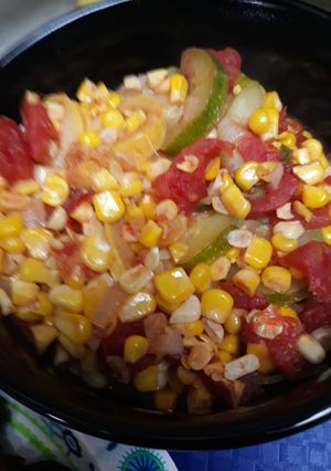 A picture of Vegetables on a stovetop.