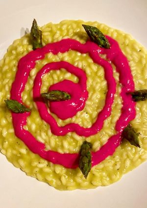 A picture of Asparagus Risotto with Beet Burrata.