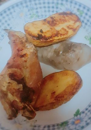 Una foto de Conejo al horno con papas fáciles de hacer