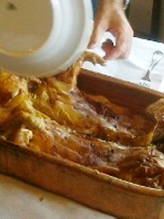 Una foto de Cochinillo asado al horno