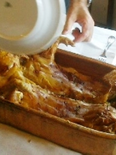 Una foto de Cochinillo asado al horno