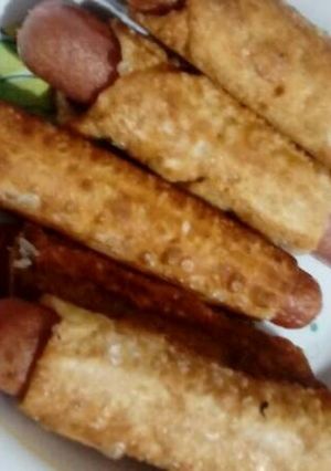 Una foto de Salchichas envueltas fritas
