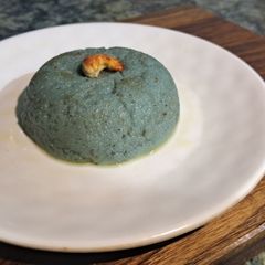 A picture of Butterfly pea flower 🦋 semolina halwa.