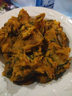 A picture of Porridge Cocoayam garnished with scent leaf and dryfish#teamabuj.