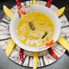 Raw mango poppu (Raw mango dal) A picture of Raw mango poppu (Raw mango dal).
