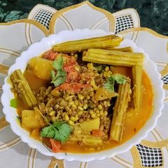 A picture of Green Lentils Drumstick Curry.