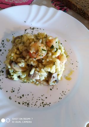 Una foto de Risotto con champiñones y gambas