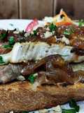 Rustic Toast with Iberian Pork Tenderloin, Brie Cheese, Caramelized Onions, and Crunchy Walnuts