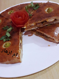 صورة لوصفة فطيرة بحشو لذيذ بدون لحوم