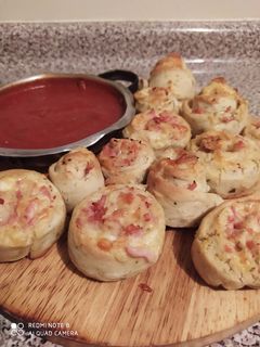 Una foto de Rollitos de pizza