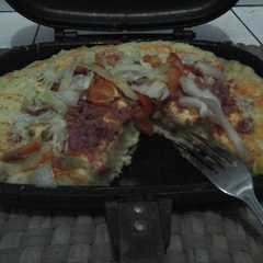 A picture of pizza teflon / happy call anti gagal .