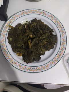 Una foto de Espinacas al ajillo
