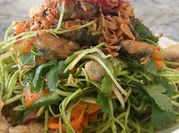 A picture of spinach and carrot salad