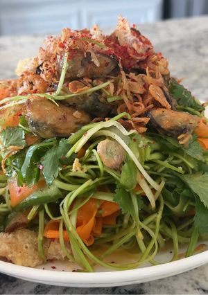 A picture of Morning Glory Salad with Stir-Fried Lemongrass Mussels.