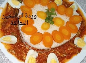 صورة لوصفة كيكة الأرز بالسكالوب وصلصة الطماطم