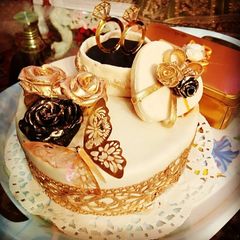 A picture of Marshmallow Fondant Cake (Engagement Themed).
