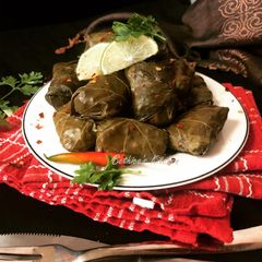 A picture of Dolmas / Dolmades (Stuffed Grape Leaves).