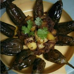 A picture of Stuff eggplant with potato.