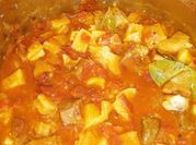 Una foto de callos con tomate