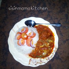 White rice with fish stew A picture of White rice with fish stew.