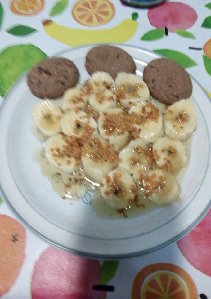 Una foto de Plátano con miel, polen y galletas de avena integral