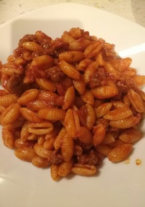A picture of Pasta with sausage ragu.