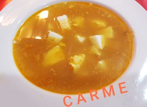 Foto principal de Sopa de pescado con huevo picado