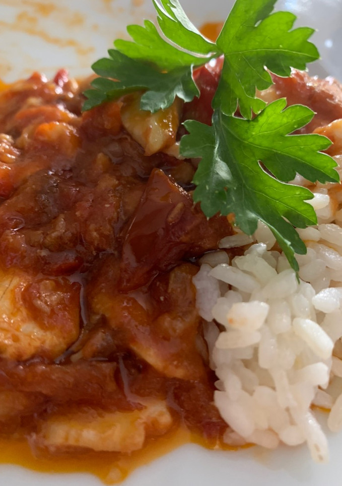 Una foto de Bacalao con tomate