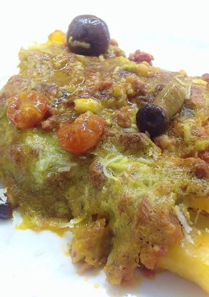 Foto di Lasagne al forno con ragù e crema di burrata, pistacchi e rosmarino