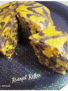 A picture of Orange Marble Cake🍊🎂.