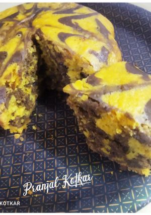 A picture of Orange Marble Cake🍊🎂.