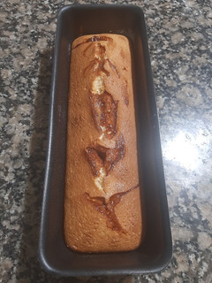 Una foto de Budín de coco y dulce de leche
