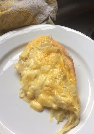 Una foto de Tarta de cebolla y queso