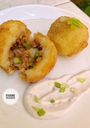 Una foto de 🍃Bombas rellenas estilo burger🍃
