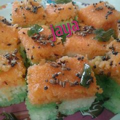 A picture of Tri-color rava dhokla.