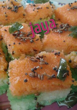 A picture of Tri-color rava dhokla.