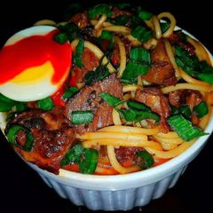 A picture of Mike's Prime Rib Yakamein Soup.