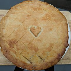 A picture of Pork leek and apple shortcrust pie.