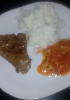 A picture of Ox liver with tomato gravy.