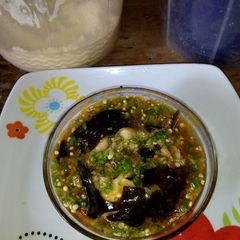 A picture of Okro soup with Fresh fish.